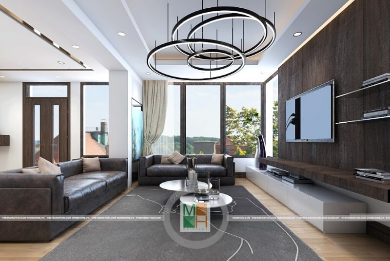 Mẫu thiết kế phòng khách chung cư hiện đại với bộ sofa bọc da cao cấp tạo điểm nhấn nổi bật cho căn phòng